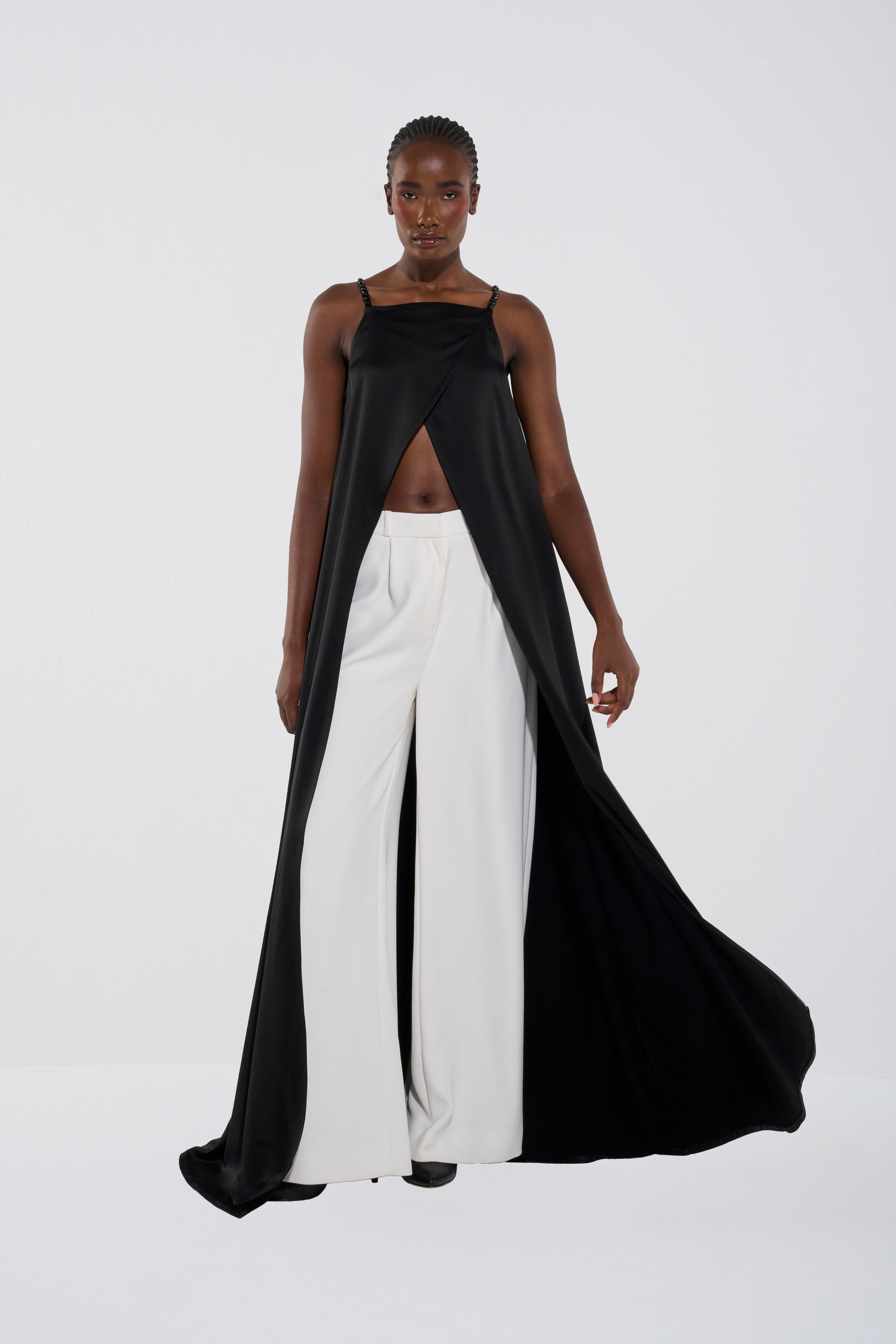 Sculptural Jumpsuit and Tailored Trousers Set
